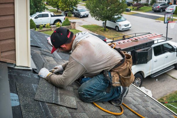 Professional Gutter Repair And Installation technician working in Fitchburg, WI